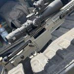 fundamentalsLevel2SomeFreeWisdomGallery1 Close up of a rifle in the back of a pickup truck.